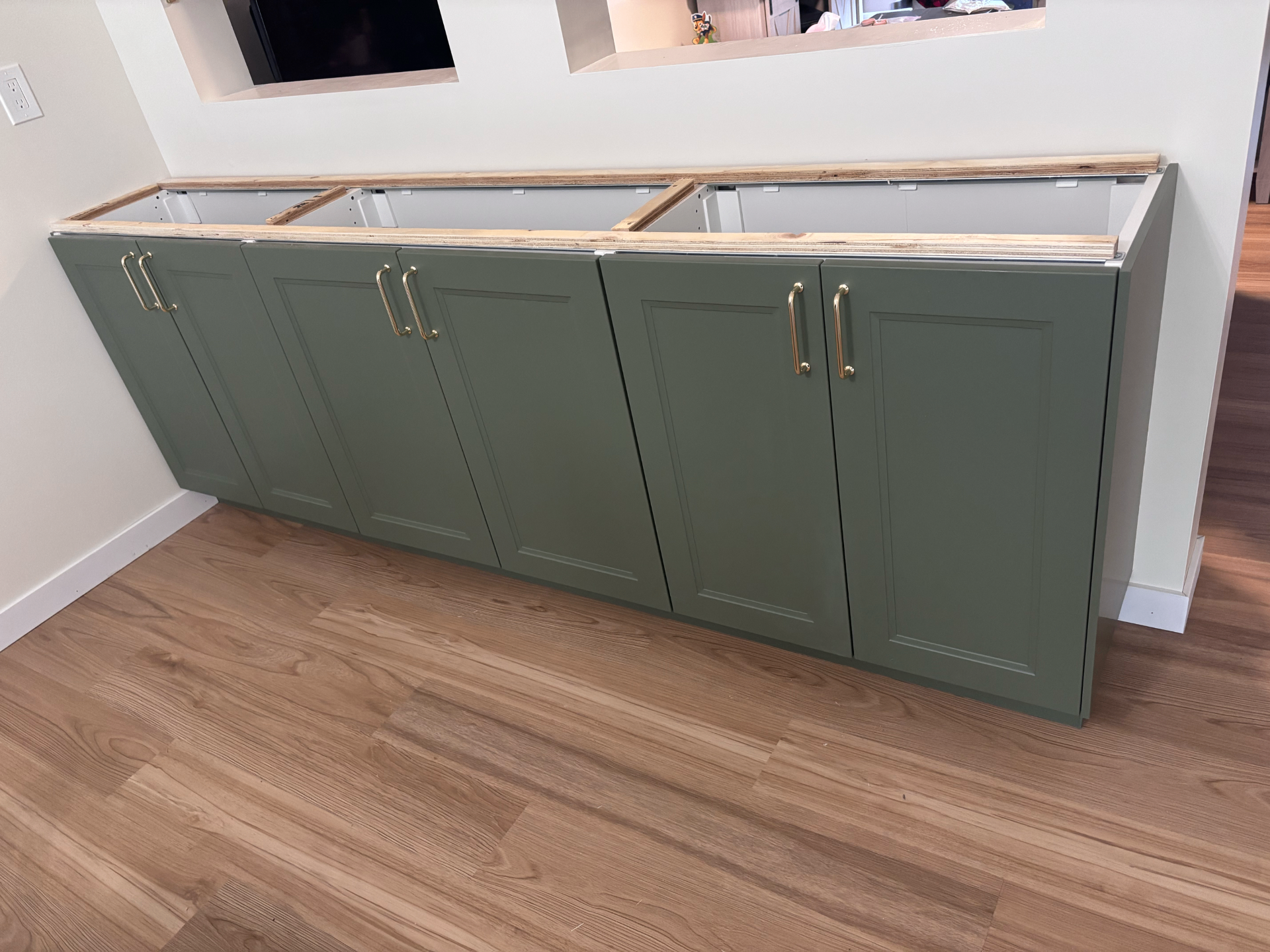 Before: The cabinet run was levelled, secured and prepared for a made to fit countertop. in Milton, Ontario