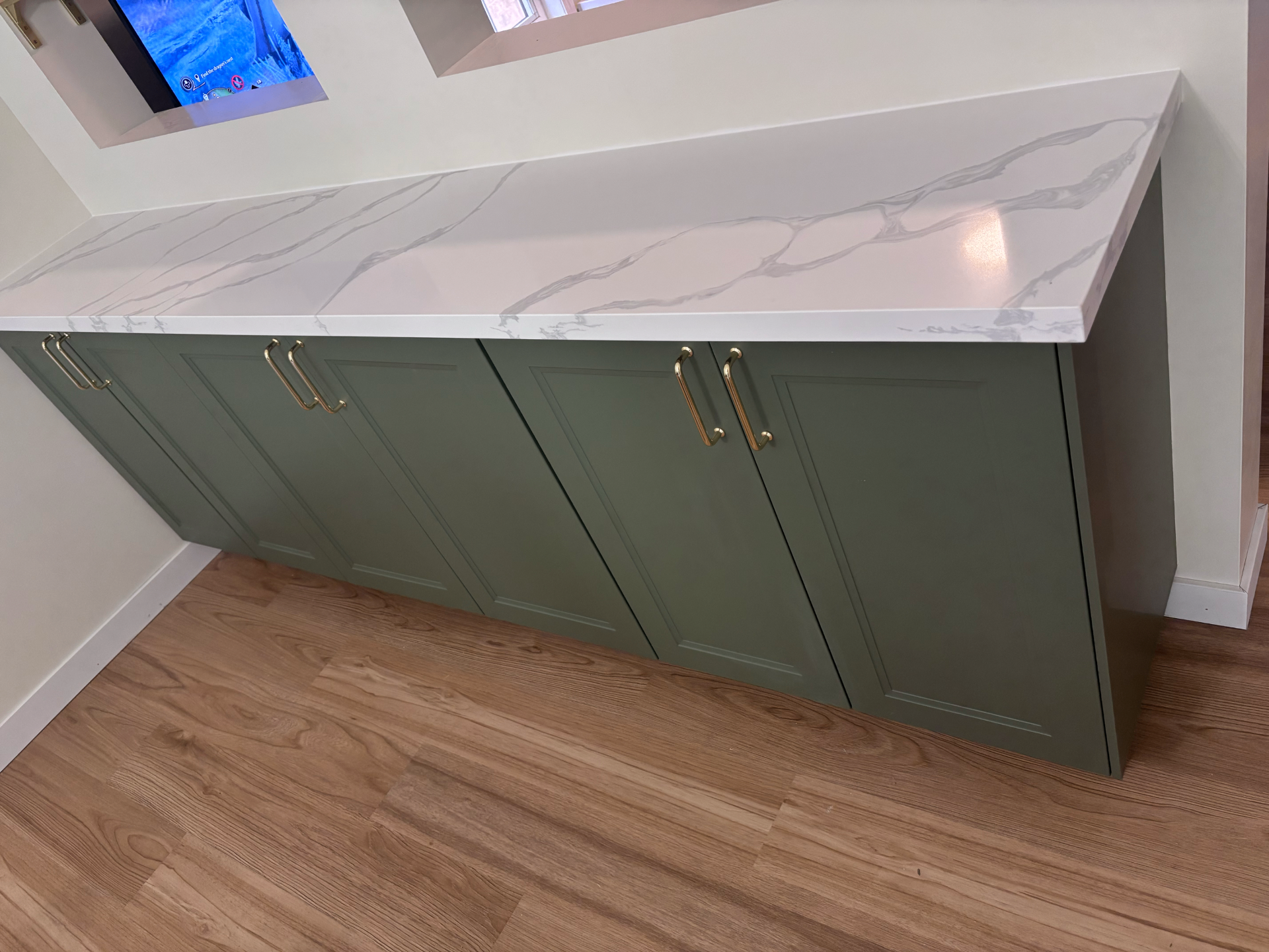 After: A marble look countertop was fitted with clean edges and a polished finish. in Milton, Ontario